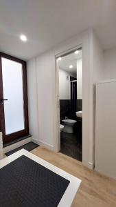 a bathroom with a toilet and a sink at Casa Nina in Amalfi +50 photos