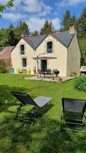 Κήπος έξω από το La maison au cœur de la forêt