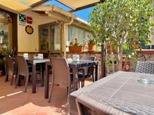 Reštaurácia alebo iné gastronomické zariadenie v ubytovaní Hotel Soleado