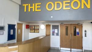 a hallway of a hospital with theoit sign on the wall at Cozy Entire Apartment with Free onsite Parking, 2-Min Walk to Barking Station in Barking