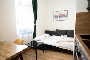 Postel nebo postele na pokoji v ubytování JS Design Apartment + 9 fotografií