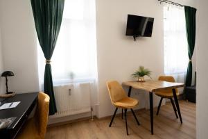 TV a/nebo společenská místnost v ubytování JS Design Apartment