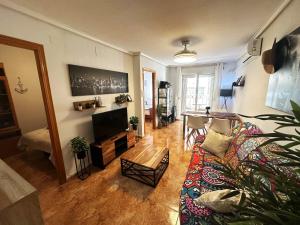 Un televizor și/sau centru de divertisment la Banderas Apartment