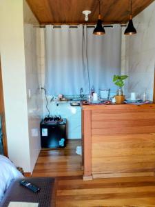 Η κουζίνα ή μικρή κουζίνα στο Chalé Sonho Diniz 4