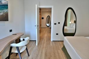 Postel nebo postele na pokoji v ubytování Asters Hotel