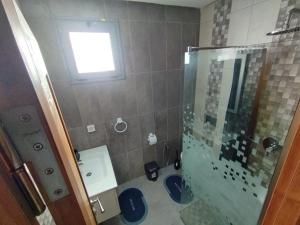 Koupelna v ubytování Résidence Inès Djerba Appartement de Luxe + 28 fotografií