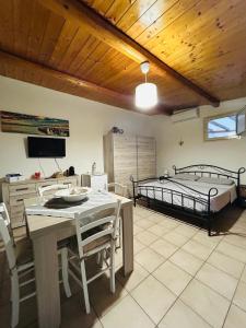 Postel nebo postele na pokoji v ubytování Casa Vacanza Delfino Azzurro - Noto Marina -