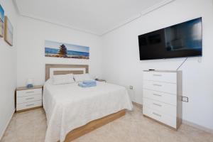 Łóżko lub łóżka w pokoju w obiekcie Studio RELAX playa del Cura, Felix Rodriguez 3