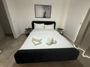 J&G Suites客房内的一张或多张床位