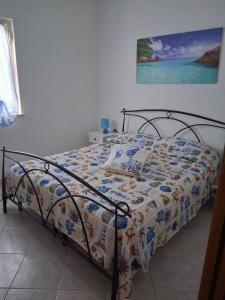 Postel nebo postele na pokoji v ubytování Brezza di Mare