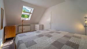 Postel nebo postele na pokoji v ubytování Apartman pri Kupi