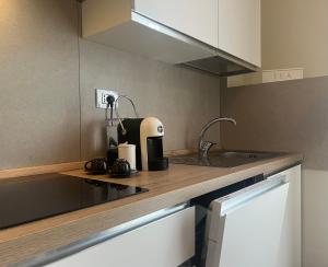 Køkken eller tekøkken på Livraghi3 Cozy Apartment + 3 billeder