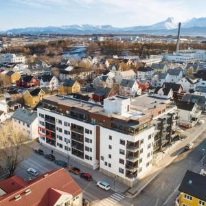 an aerial view of a city with buildings at Sentrumsnær leilighet i Bodø in Bodø