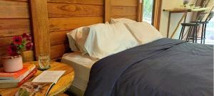 Φωτογραφία από το άλμπουμ του Cabana de madeira entre as árvores σε Piedade