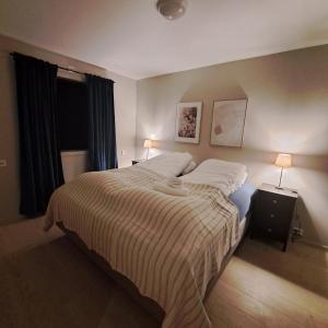 Postel nebo postele na pokoji v ubytování Storm Hotel Senja