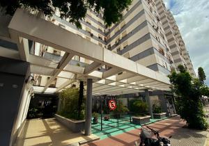 a large building with a no parking sign in front of it at El rincón de boedo in Buenos Aires