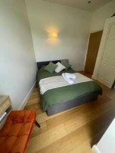 Postelja oz. postelje v sobi nastanitve Boho Bliss in Towcester
