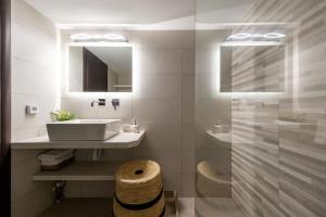 Kúpeľňa v ubytovaní Azzurro Bianco Suites