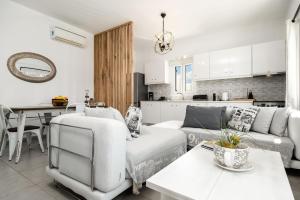 Kuchyňa alebo kuchynka v ubytovaní Azzurro Bianco Suites