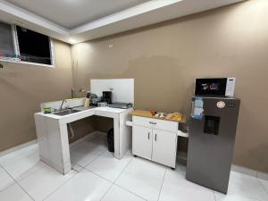 מטבח או מטבחון ב-10 minutos de UNAH Apartamento de 2 cuartos completo