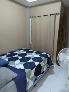 מיטה או מיטות בחדר ב-10 minutos de UNAH Apartamento de 2 cuartos completo