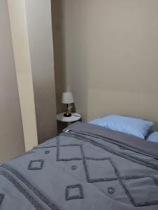 מיטה או מיטות בחדר ב-10 minutos de UNAH Apartamento de 2 cuartos completo