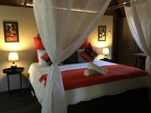 Katil atau katil-katil dalam bilik di Biggy Best Boutique Hotel & Self Catering Cottages