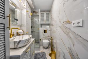 Koupelna v ubytování Apartments with view of Warsaw 23rd floor + 24 fotografií