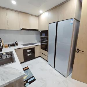 Η κουζίνα ή μικρή κουζίνα στο Gracey Concierge Apartments - Avenue Uvira