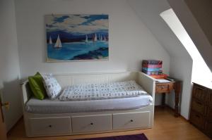 Łóżko lub łóżka w pokoju w obiekcie City Apartment Vasiri