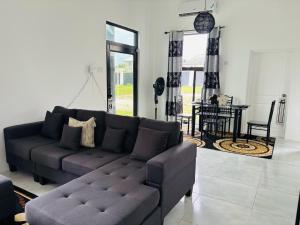 Posezení v ubytování Paradise Palm Villa