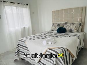 Postel nebo postele na pokoji v ubytování Paradise Palm Villa
