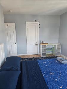 Postel nebo postele na pokoji v ubytování Cozy room in Baltimore city