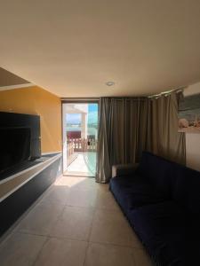 Posezení v ubytování Apartamento para até 6 pessoas - Orla da Praia Grande