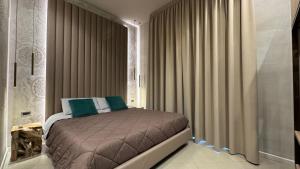 Posteľ alebo postele v izbe v ubytovaní Tropicana Room