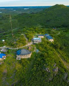 an aerial view of a house on a hill at La Richard Refugio Boutique in Dique Nivelador
