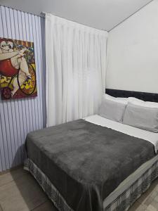 Postel nebo postele na pokoji v ubytování Gastaldon Suite + 37 fotografií