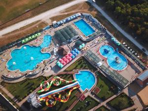 an overhead view of a swimming pool at an amusement park at COMODO "Green Hill" in Soko Banja