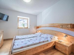 Postel nebo postele na pokoji v ubytování Bergzeit