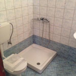 Koupelna v ubytování Hotel Akrogiali