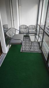 Istumisnurk majutusasutuses chambre enjoyed privé espaces communs à partager