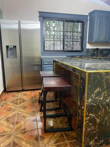 Kuhinja oz. manjša kuhinja v nastanitvi Hostal Marias