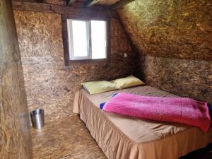 Postel nebo postele na pokoji v ubytování Valle Colibrí