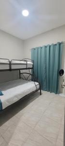 Katil atau katil-katil dalam bilik di Monaco Aparments