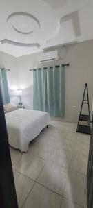 Katil atau katil-katil dalam bilik di Monaco Aparments