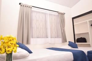 Postel nebo postele na pokoji v ubytování Quinta La Alborada