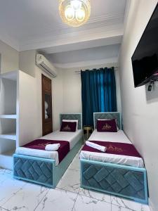 Letto o letti in una camera di Abdeen Cairo Hostel