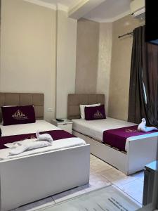 Letto o letti in una camera di Abdeen Cairo Hostel