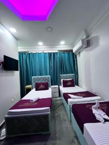 Letto o letti in una camera di Abdeen Cairo Hostel