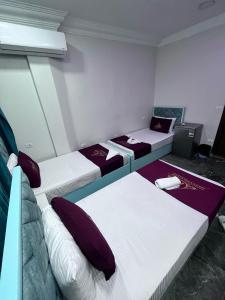 Letto o letti in una camera di Abdeen Cairo Hostel